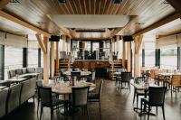A restaurant or other place to eat at Vogue Boat Apartments
