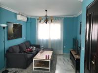 Posedenie v ubytovaní Tomares Townhouse