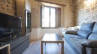 A television and/or entertainment centre at Capricho Toledano