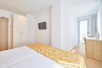 Łóżko lub łóżka w pokoju w obiekcie Hotel Ilusion Moreyo - Adults Only