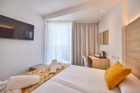 Łóżko lub łóżka w pokoju w obiekcie Hotel Ilusion Moreyo - Adults Only