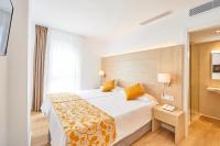 Łóżko lub łóżka w pokoju w obiekcie Hotel Ilusion Moreyo - Adults Only