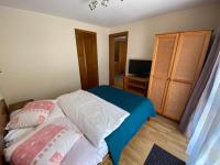Posteľ alebo postele v izbe v ubytovaní APARTAMENTY PASJA -2 minuty do plaży