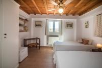 Postel nebo postele na pokoji v ubytování Villa Abella Paraga Mykonos, Traditional with amazing sea view, up to 6 people