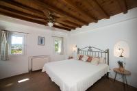 Postel nebo postele na pokoji v ubytování Villa Abella Paraga Mykonos, Traditional with amazing sea view, up to 6 people