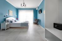 Postel nebo postele na pokoji v ubytování Evi Boutique Rooms