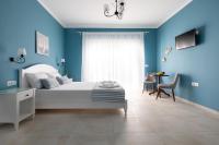 Postel nebo postele na pokoji v ubytování Evi Boutique Rooms