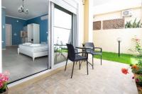 Postel nebo postele na pokoji v ubytování Evi Boutique Rooms