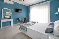 TV a/nebo společenská místnost v ubytování Evi Boutique Rooms