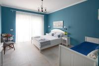 Postel nebo postele na pokoji v ubytování Evi Boutique Rooms