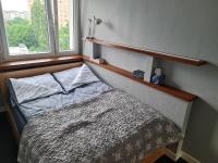 Posteľ alebo postele v izbe v ubytovaní Apartament Wyszyńskiego Szczecin Polska