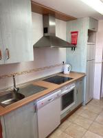 Kuchyň nebo kuchyňský kout v ubytování Costa Esuri Golf Apartments