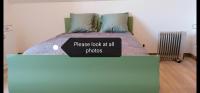 Posteľ alebo postele v izbe v ubytovaní Chambre parentale chez l'habitant