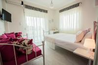 Posteľ alebo postele v izbe v ubytovaní Chelona Apartments