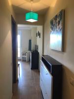 Telewizja i/lub zestaw kina domowego w obiekcie APARTAMENTO PREMIUM A 1,8KM DE LA PLAYA