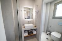 Kúpeľňa v ubytovaní Theros Suites