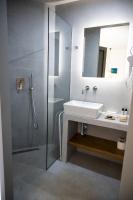 Kúpeľňa v ubytovaní Theros Suites