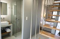 Kúpeľňa v ubytovaní Theros Suites