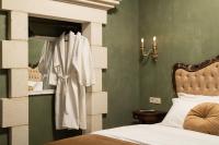 Postel nebo postele na pokoji v ubytování Nobili Boutique Hotel