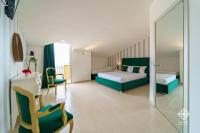 Posteľ alebo postele v izbe v ubytovaní Villa Vittoria - Waterfront house