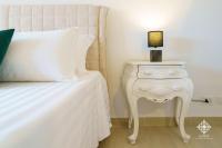 Posteľ alebo postele v izbe v ubytovaní Villa Vittoria - Waterfront house
