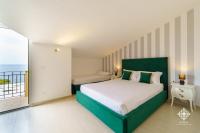 Posteľ alebo postele v izbe v ubytovaní Villa Vittoria - Waterfront house