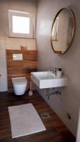 Kúpeľňa v ubytovaní Apartment KIM