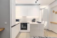 Kuchyňa alebo kuchynka v ubytovaní Sunrise Rent Rooms