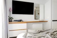 Televízia a/alebo spoločenská miestnosť v ubytovaní Sunrise Rent Rooms