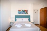 Łóżko lub łóżka w pokoju w obiekcie Hotel Royal Garnì