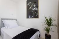Postel nebo postele na pokoji v ubytování Apartments Taratta 1
