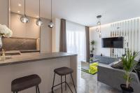 TV a/nebo společenská místnost v ubytování Apartments Taratta 1