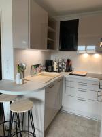 Kuchyňa alebo kuchynka v ubytovaní Petit appartement cosy