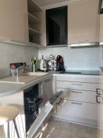 Kuchyňa alebo kuchynka v ubytovaní Petit appartement cosy