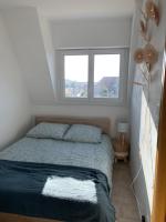 Posteľ alebo postele v izbe v ubytovaní Petit appartement cosy