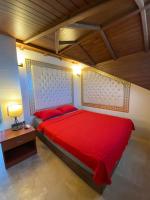 A bed or beds in a room at Castle Old Town Hotel