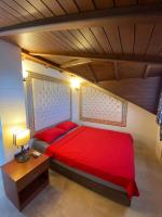A bed or beds in a room at Castle Old Town Hotel
