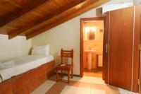 A bed or beds in a room at Papadeas Villas