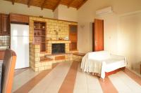 A bed or beds in a room at Papadeas Villas