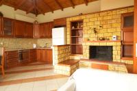 A kitchen or kitchenette at Papadeas Villas