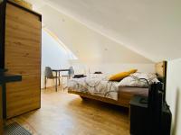 Postel nebo postele na pokoji v ubytování Apartmány v ráji (Českém)