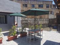 Patio alebo iná vonkajšia časť ubytovania Il Giardino in centro