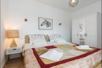 Posteľ alebo postele v izbe v ubytovaní Apartments Marta 2