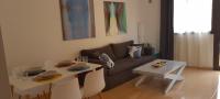 Posezení v ubytování Beautiful garden flat nearly refurbished free WiFi