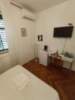Posteľ alebo postele v izbe v ubytovaní Damjan Rooms