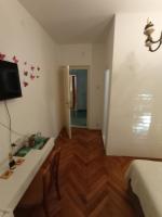 Televízia a/alebo spoločenská miestnosť v ubytovaní Damjan Rooms