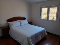 A bed or beds in a room at Rodeira