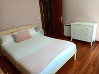 A bed or beds in a room at Rodeira