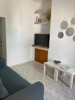 A television and/or entertainment centre at La Casita de Mari