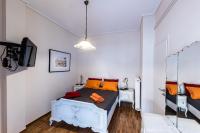 Posteľ alebo postele v izbe v ubytovaní Ami's Appartment in Athens